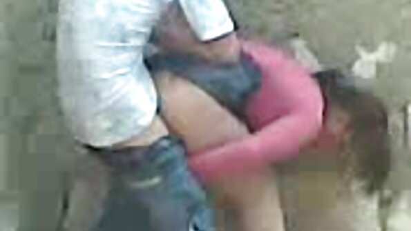 A blonde with big fake boobs is getting fucked in the bathroom